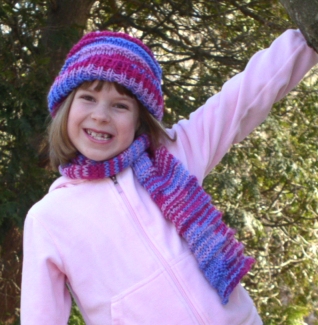 diana hanging on a tree and modeling new hat and scarf