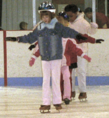 diana practices balancing on skates.